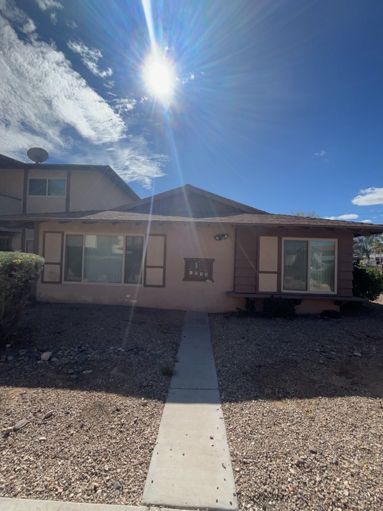 Charming fourplex with spacious units, garages, patios, and location property image