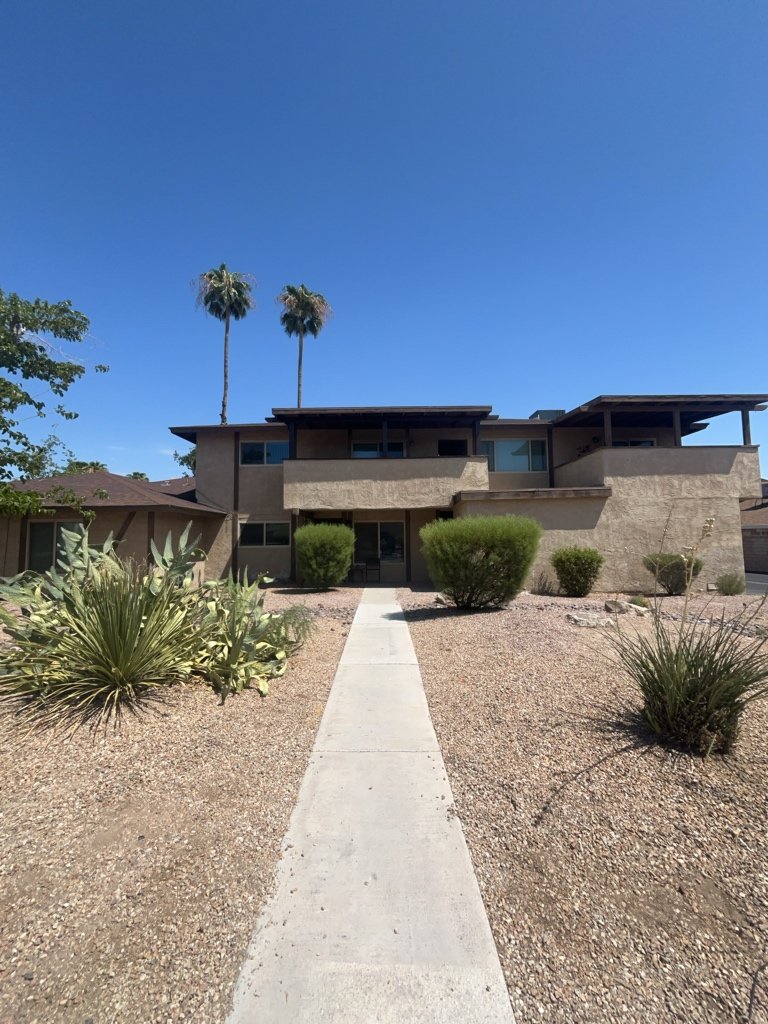 Centrally located fourplex with garages, patios, and long-term tenants. property image