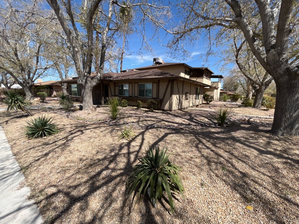 Centrally located fourplex with garages, patios, and long-term tenants. property image