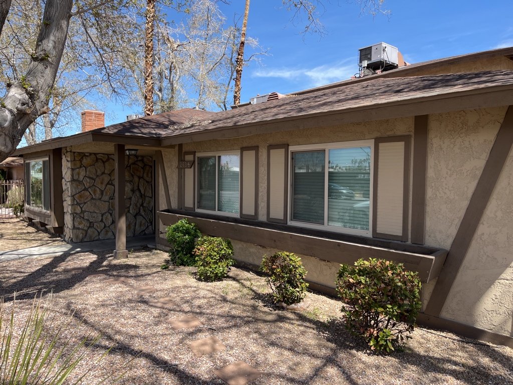 Centrally located fourplex with garages, patios, and long-term tenants. property image