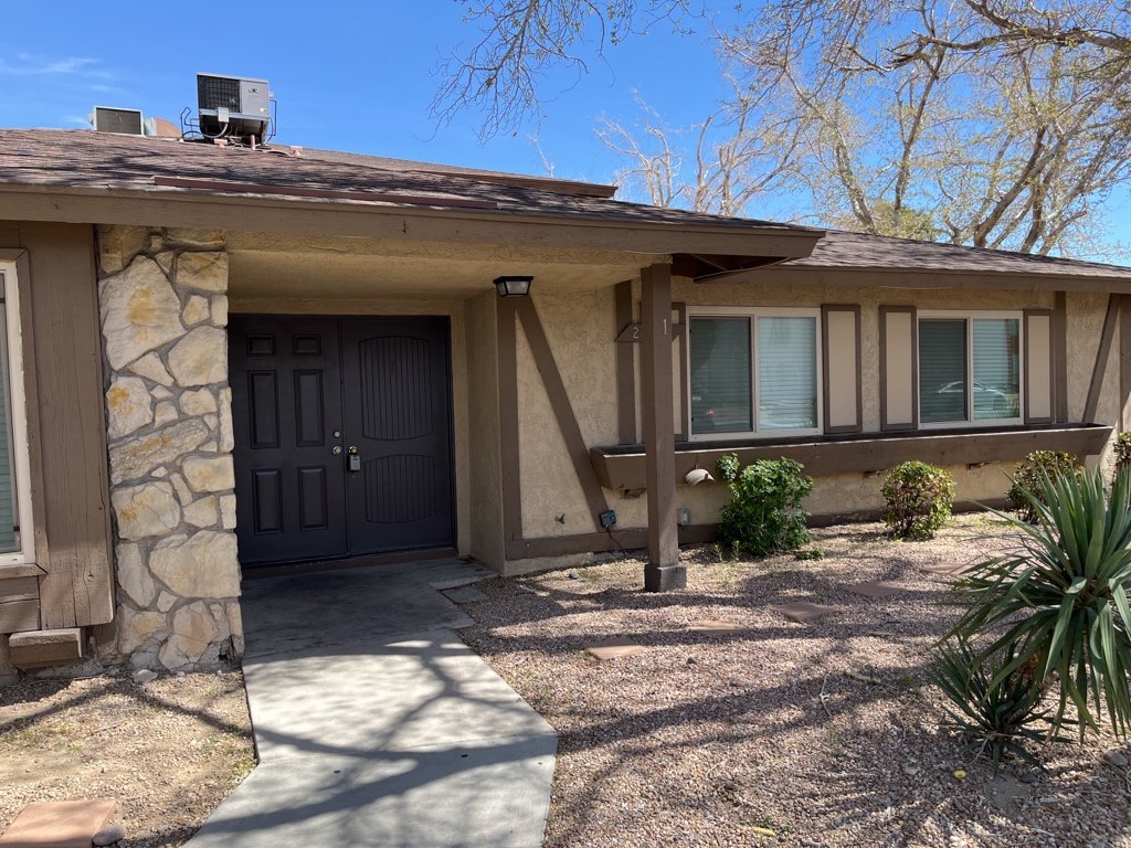 Centrally located fourplex with garages, patios, and long-term tenants. property image