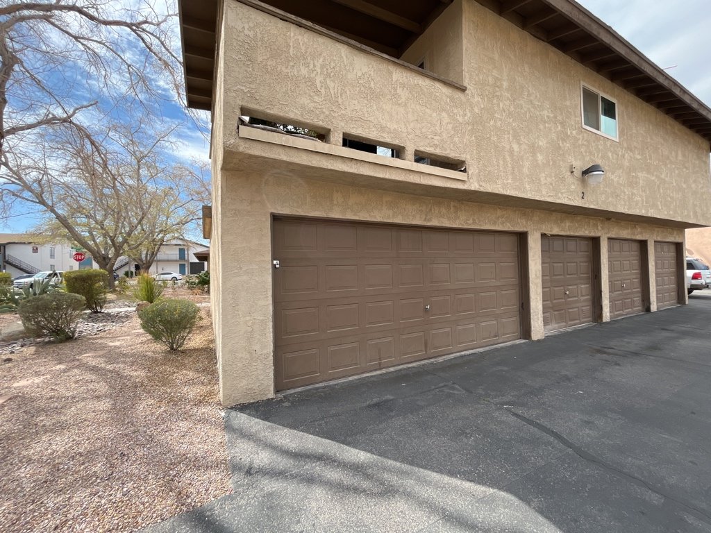 Centrally located fourplex with garages, patios, and long-term tenants. property image