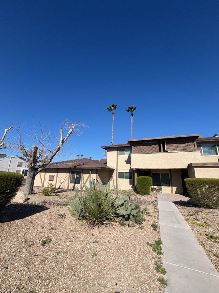 Centrally located fourplex with garages, patios, and long-term tenants. property image