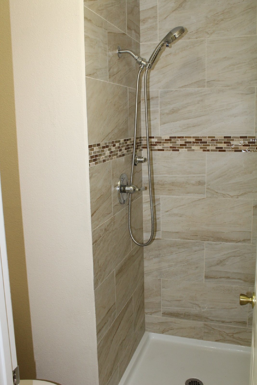 Single-story home with patio and garage property image