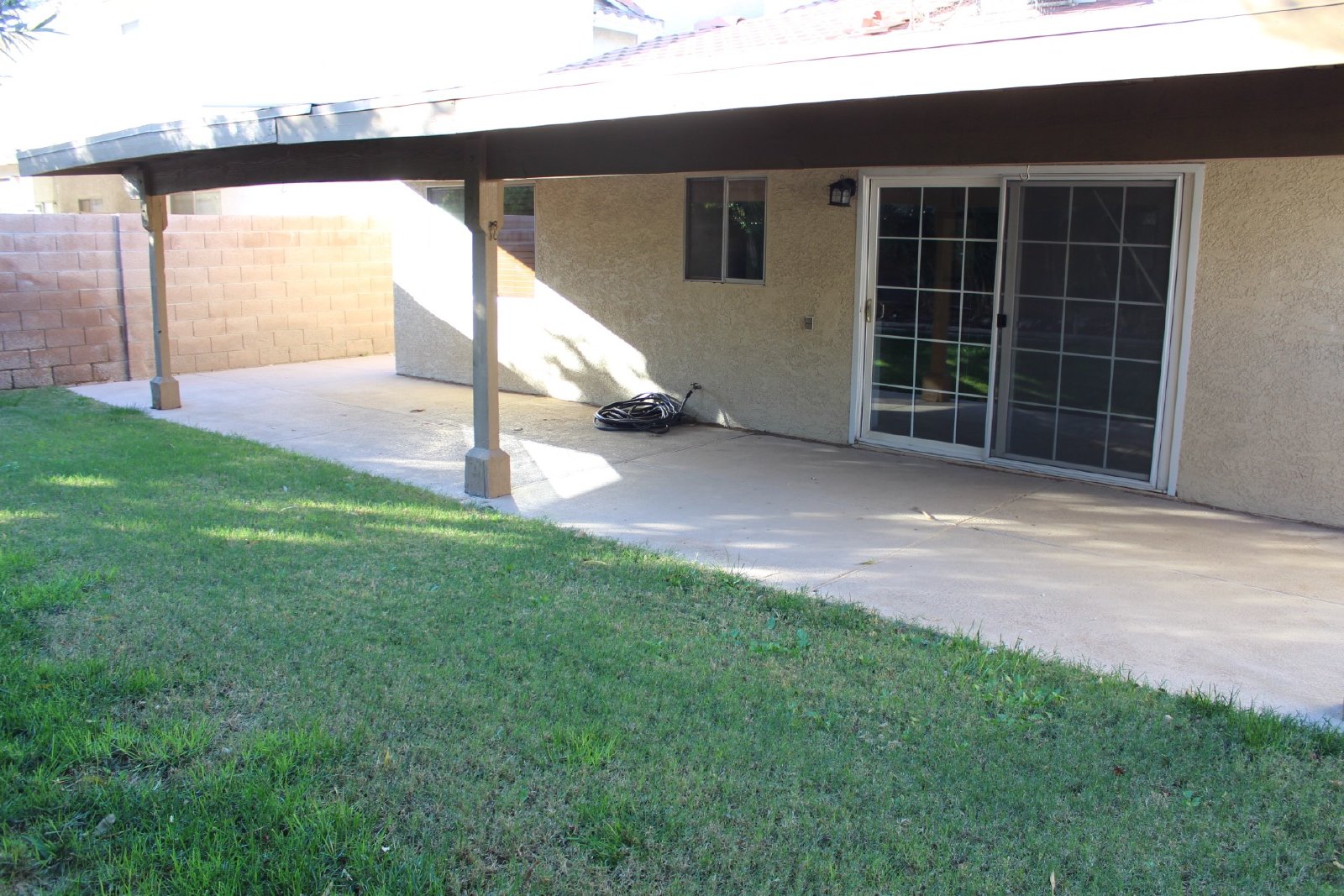 Single-story home with patio and garage property image