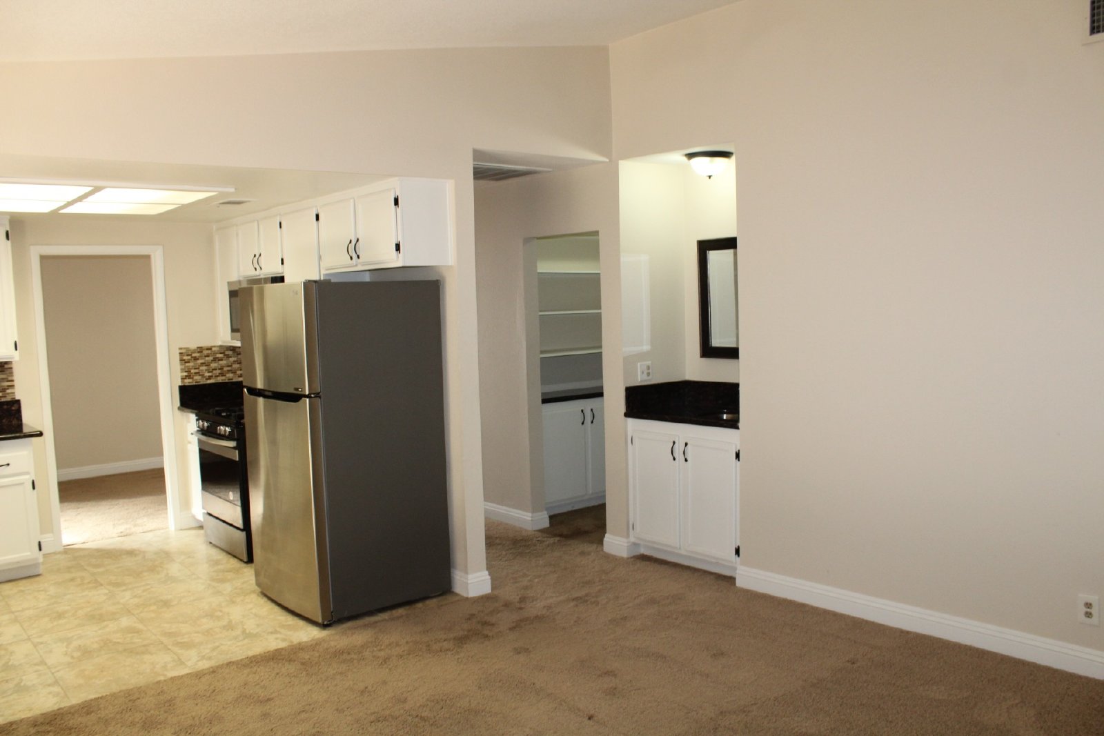 Single-story home with patio and garage property image