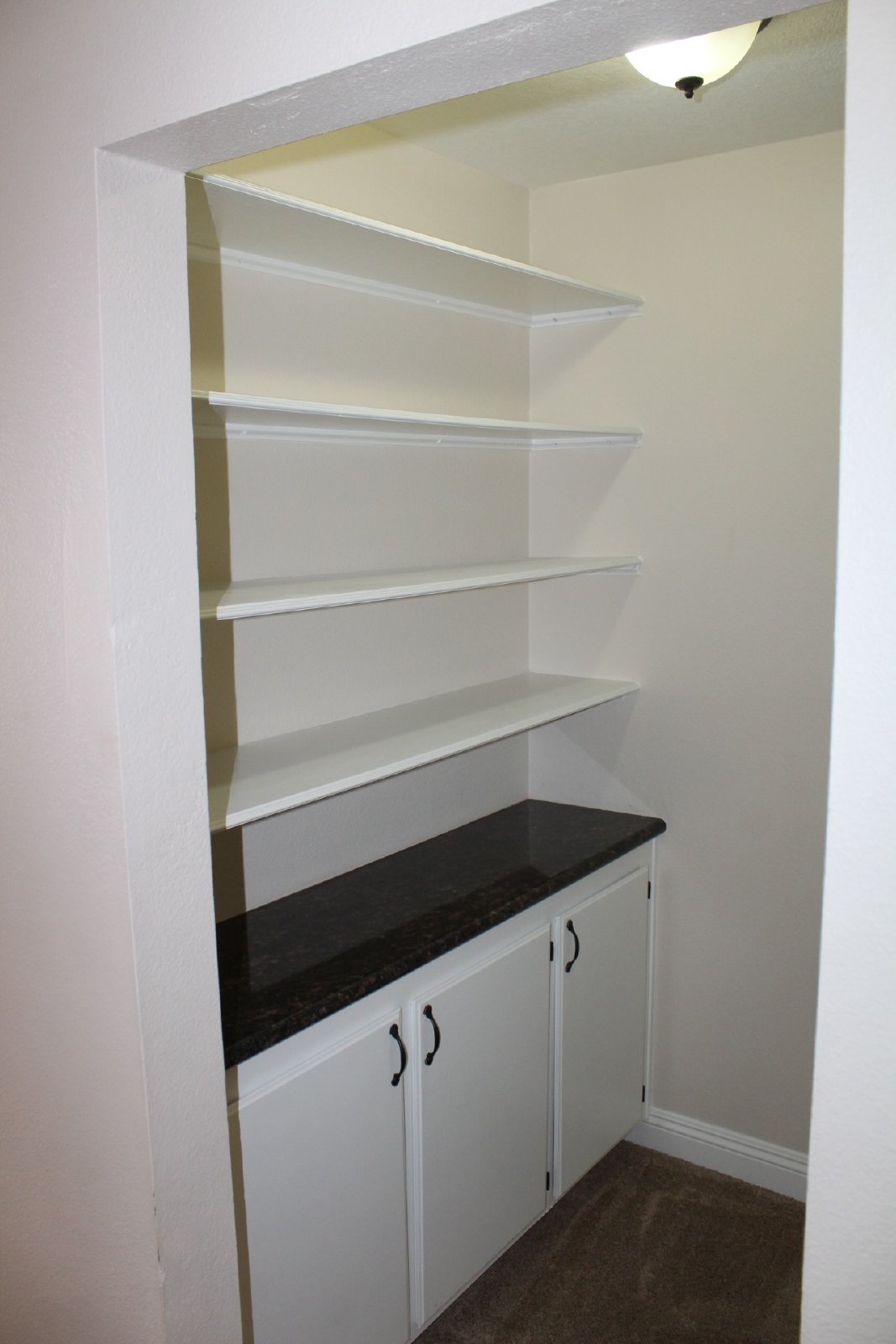 Single-story home with patio and garage property image